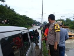 Laporan Melalui Call Center 110 Direspons Cepat, Polsek Patumbak Tangani Banjir Di Amplas