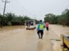 Polisi Bantu Warga Terdampak Banjir Di Langkat, Salurkan Bantuan Dan Atur Lalu Lintas